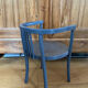 Curved wooden armchair from the late 19th/early 20th century.