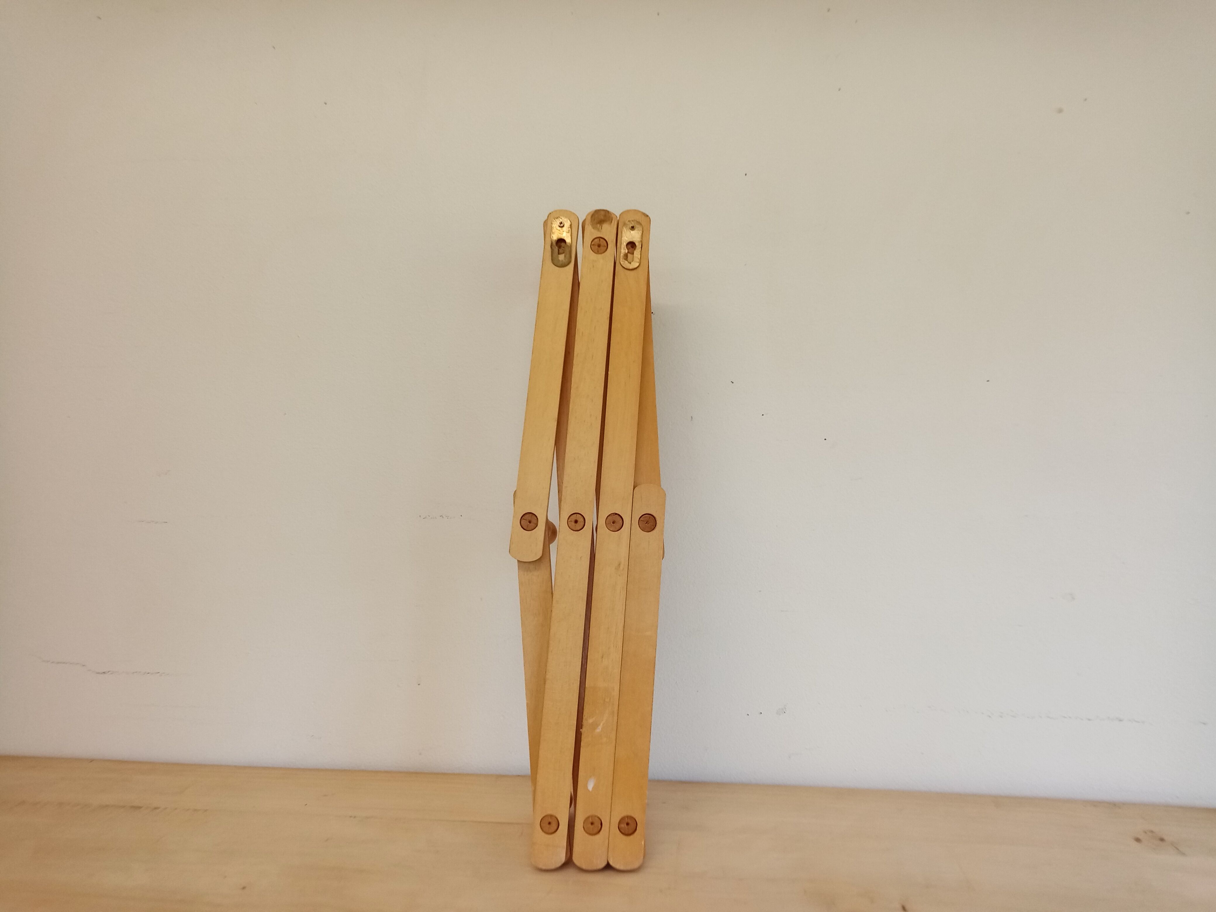 Wooden accordion coat rack