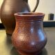 Series of 5 vintage brown ceramic vases