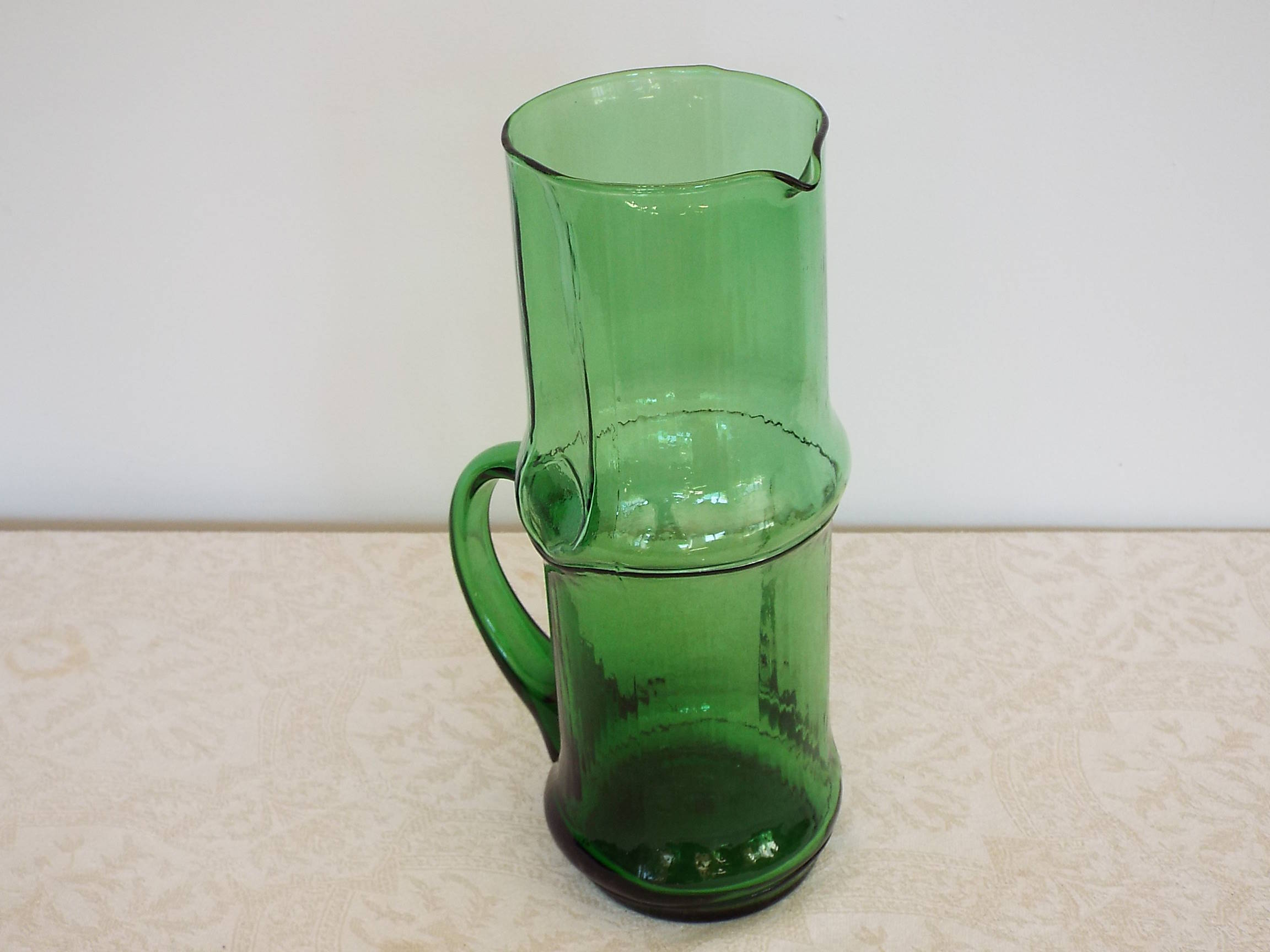 Green glass pitcher