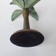 Antique palm tree-shaped candlestick in patinated metal