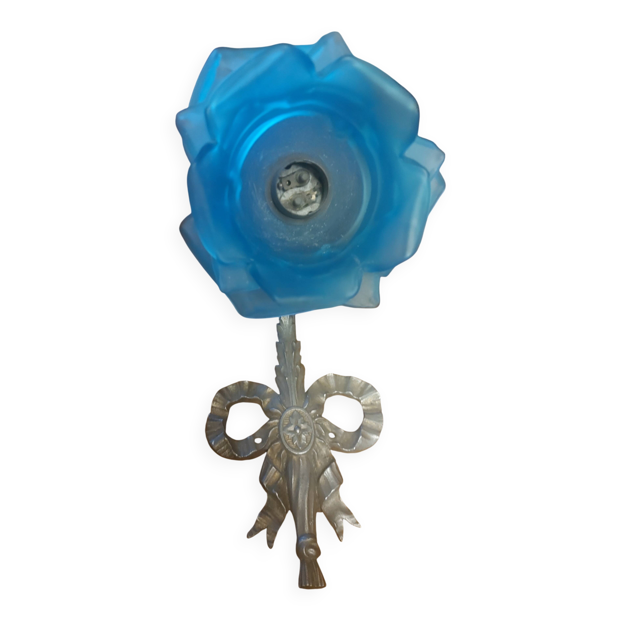 Art Deco style wall light in frosted blue glass with silver metal support.