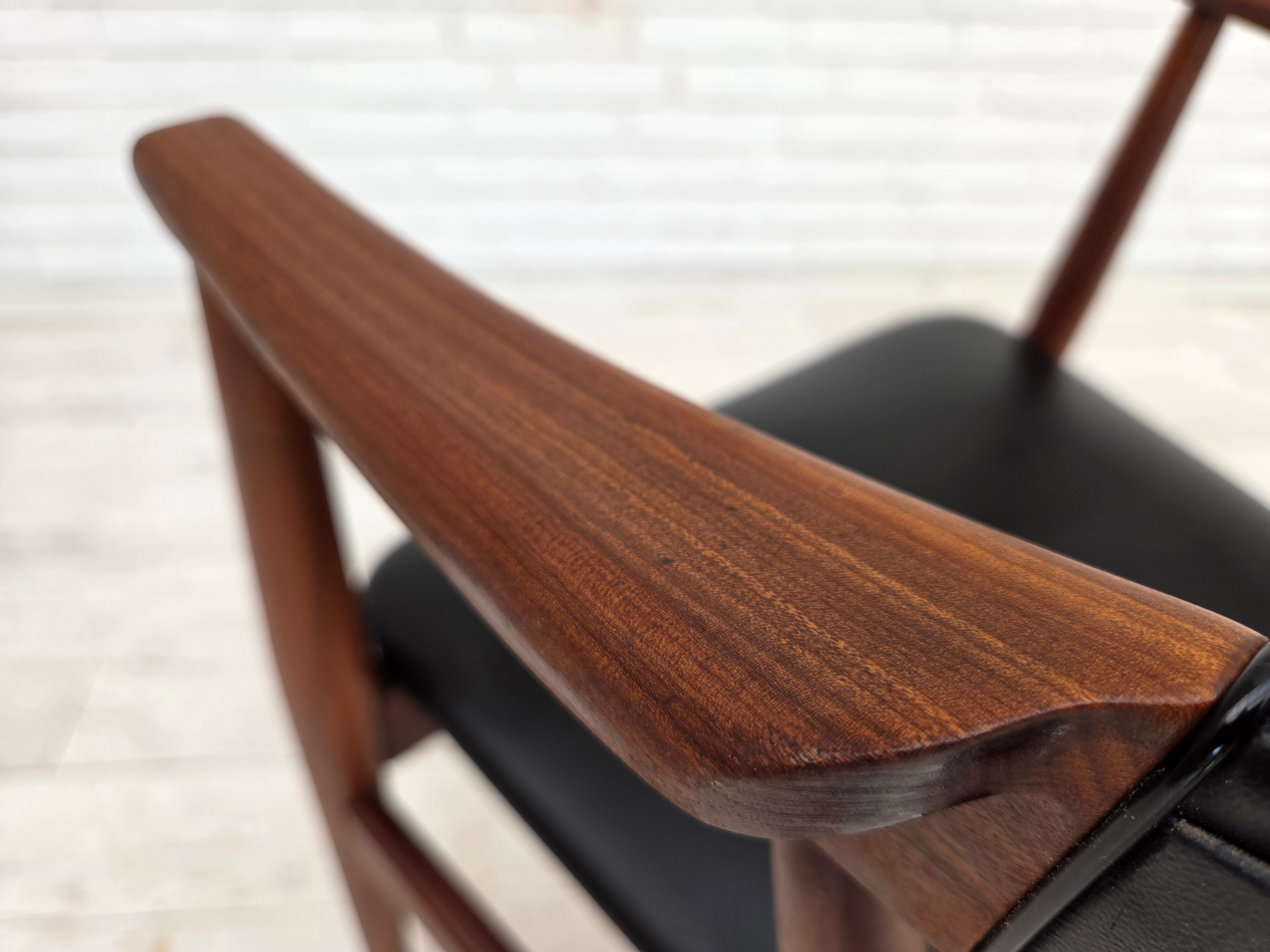 1960s, Danish armchair. Teak wood, black artificial leather.