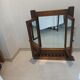 Trypic mirror, with tablet. Velvet and openwork metal braces
