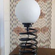 Spring lamp from the 1980s, design by Ingo Maurer.
