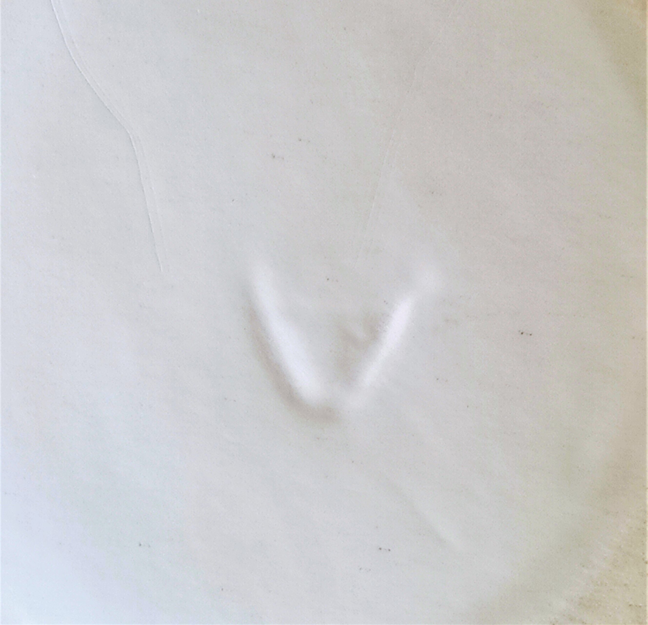 Red and white ceramic vase with vintage embossed mark