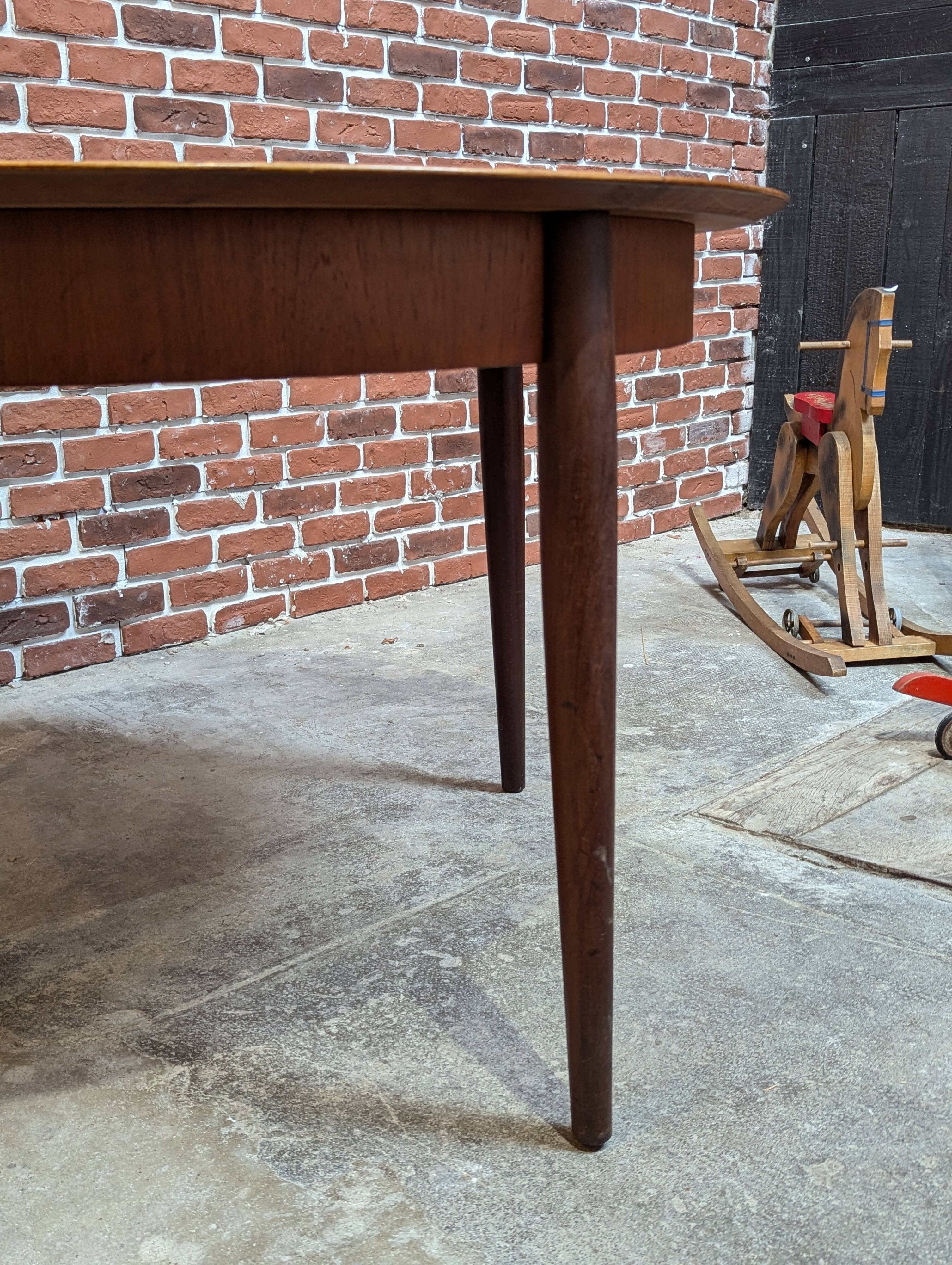 Round teak table from the 60s