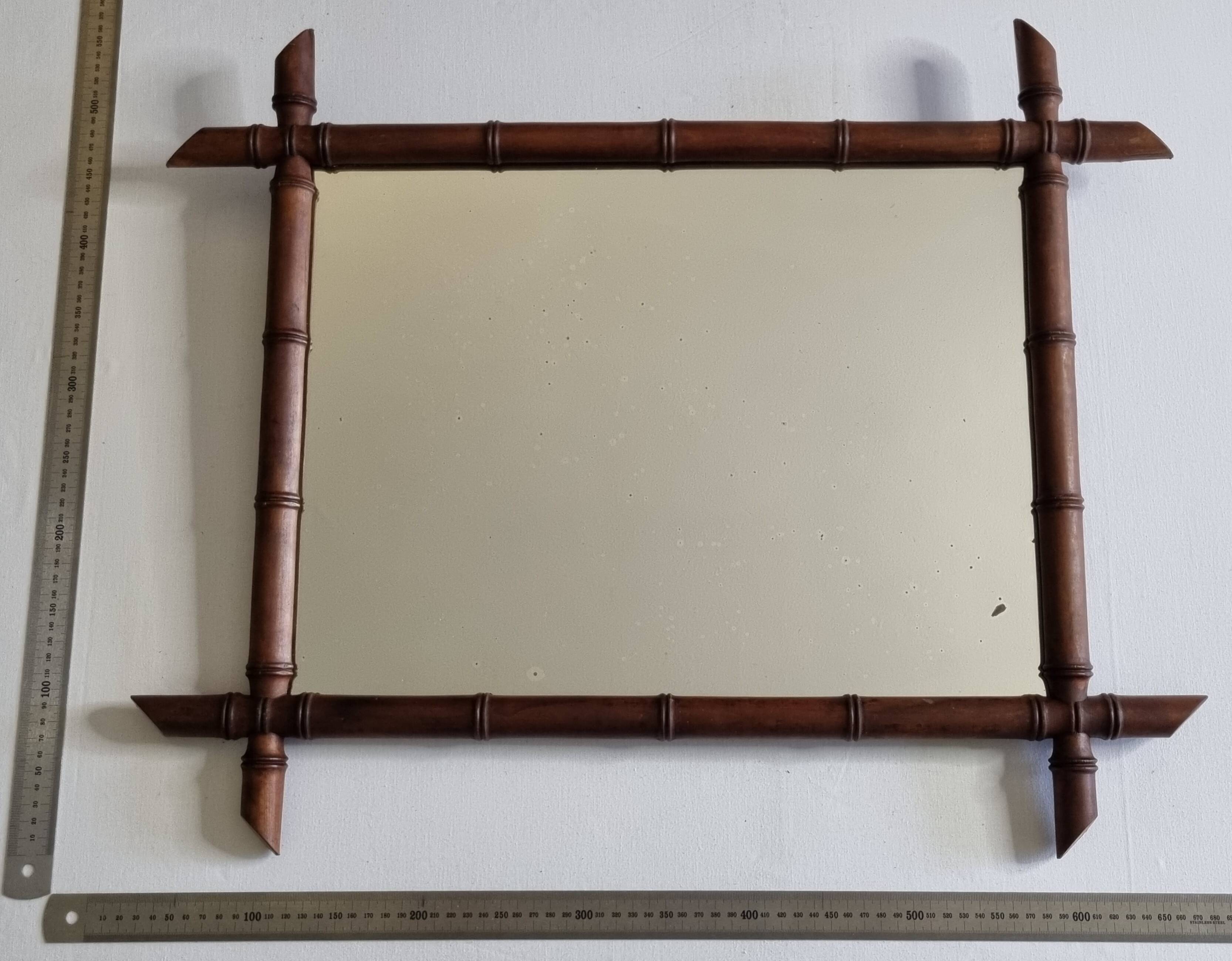 Miroir mural en bois tourné façon bambou, style Napoléon III, XIXe 67x56 cm