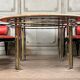 Table de salle à manger en métal chromé et doré mat , tablette en travertin vers 1980
