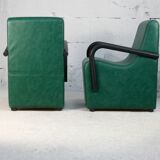 Pair of armrest heaters. Steel and green imitation leather. France, circa 1980