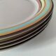 4 large graphic plates with multicoloured stripes – 26 cm