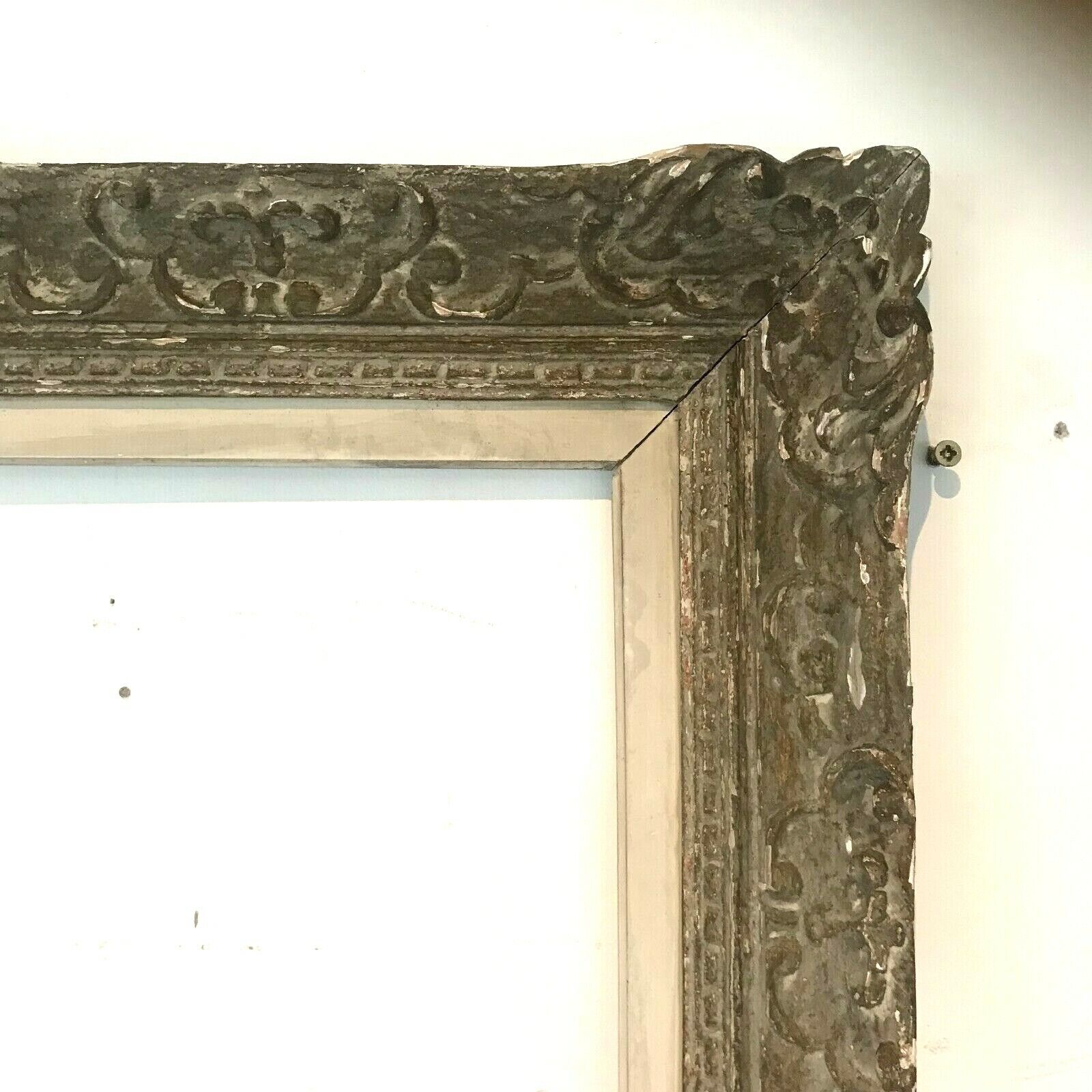 Wooden frame and patinated stucco XX century