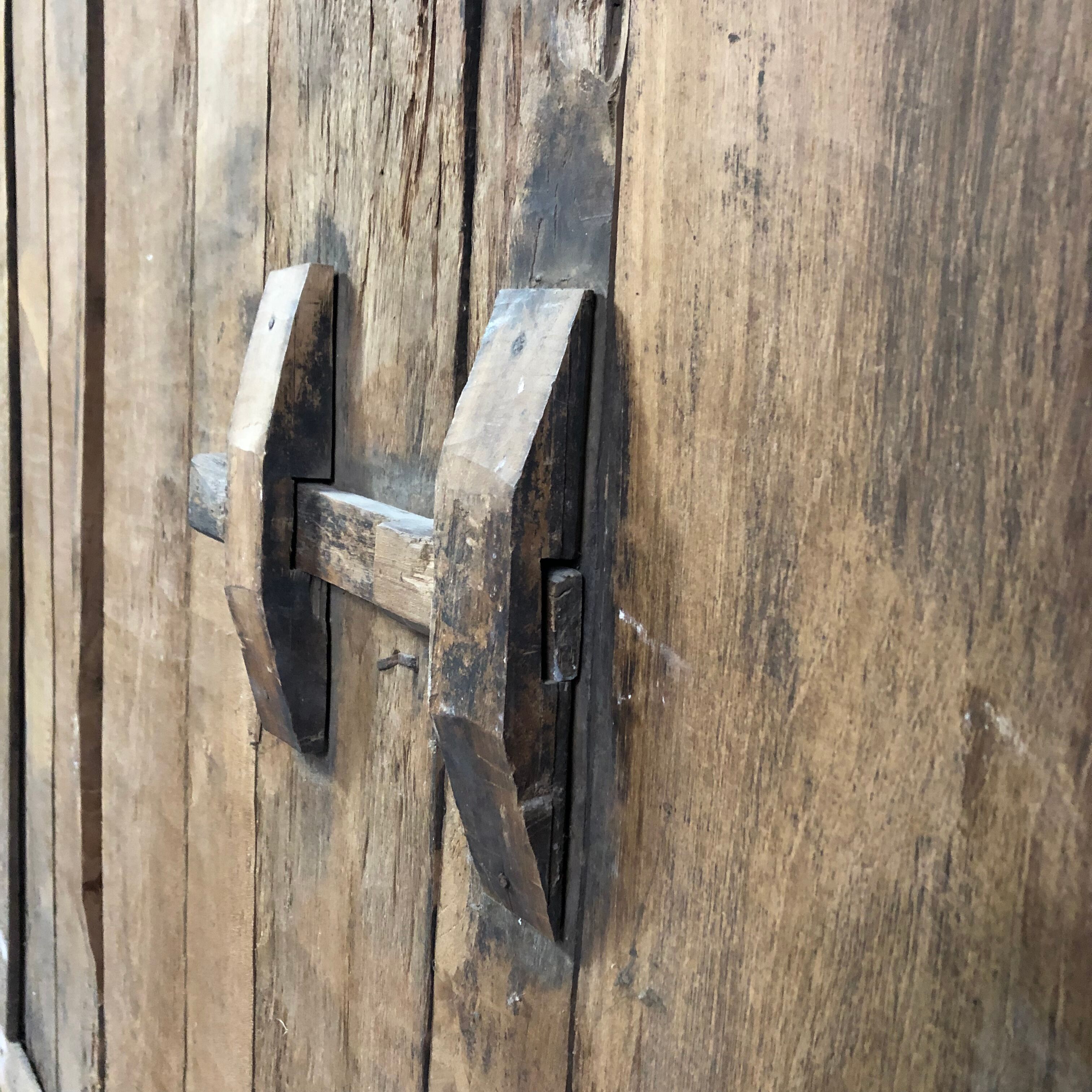 Old wooden door with its frame