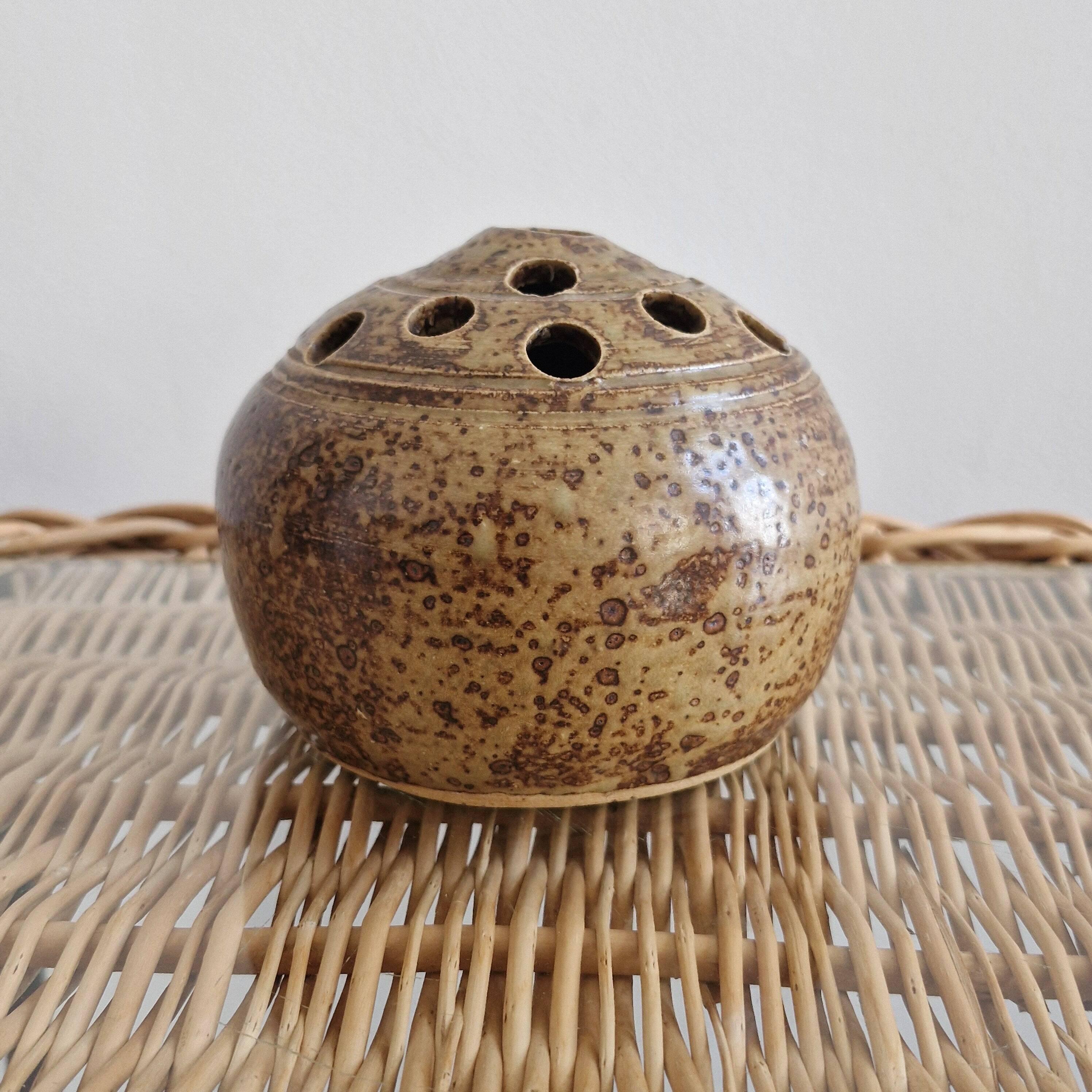 Vase with pyrite sandstone flowers