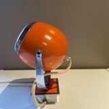 Orange eye ball wall lamp
