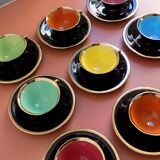 set of 9 black and gold Salins cups and saucers