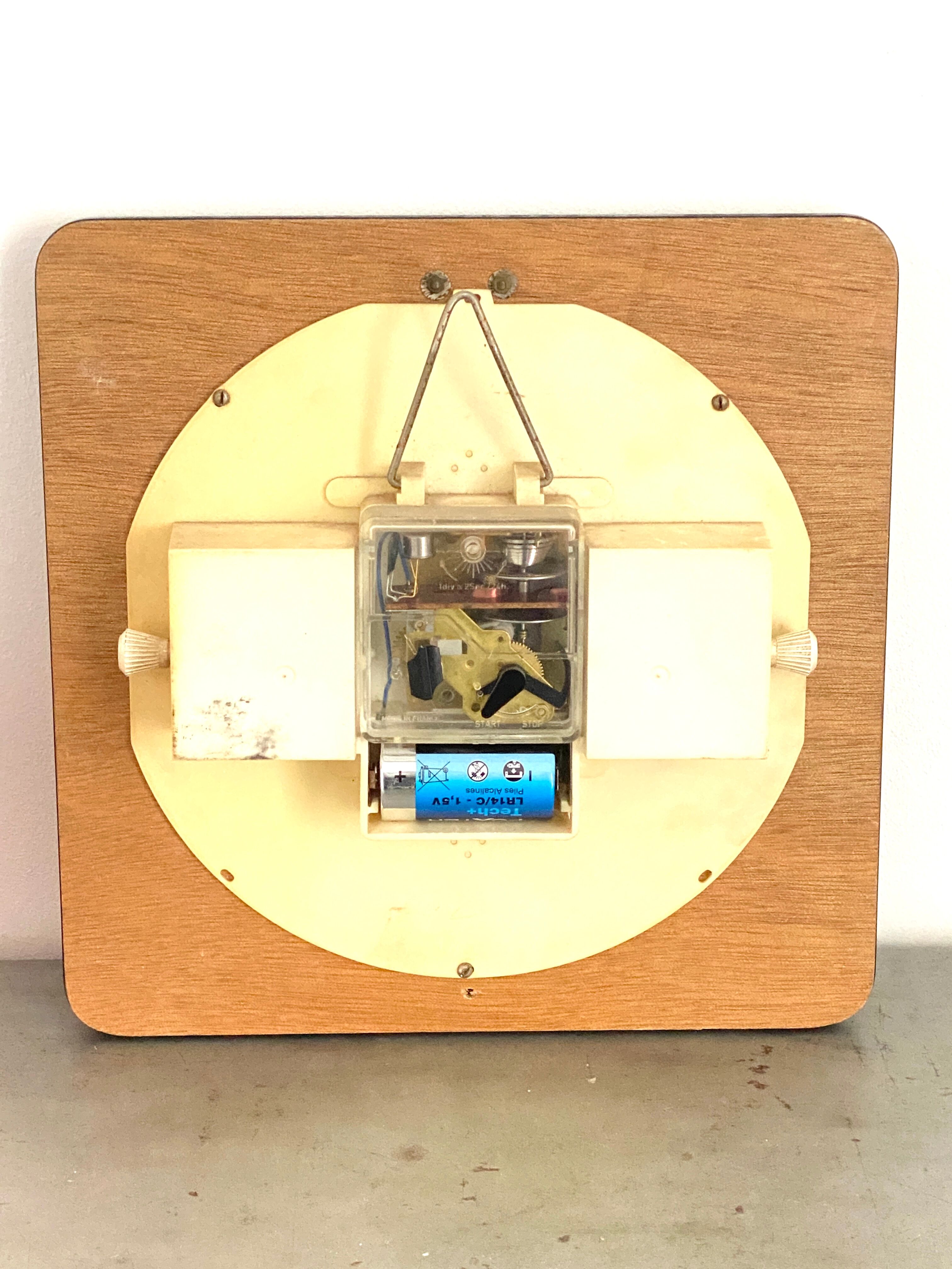 Vintage orange wall clock