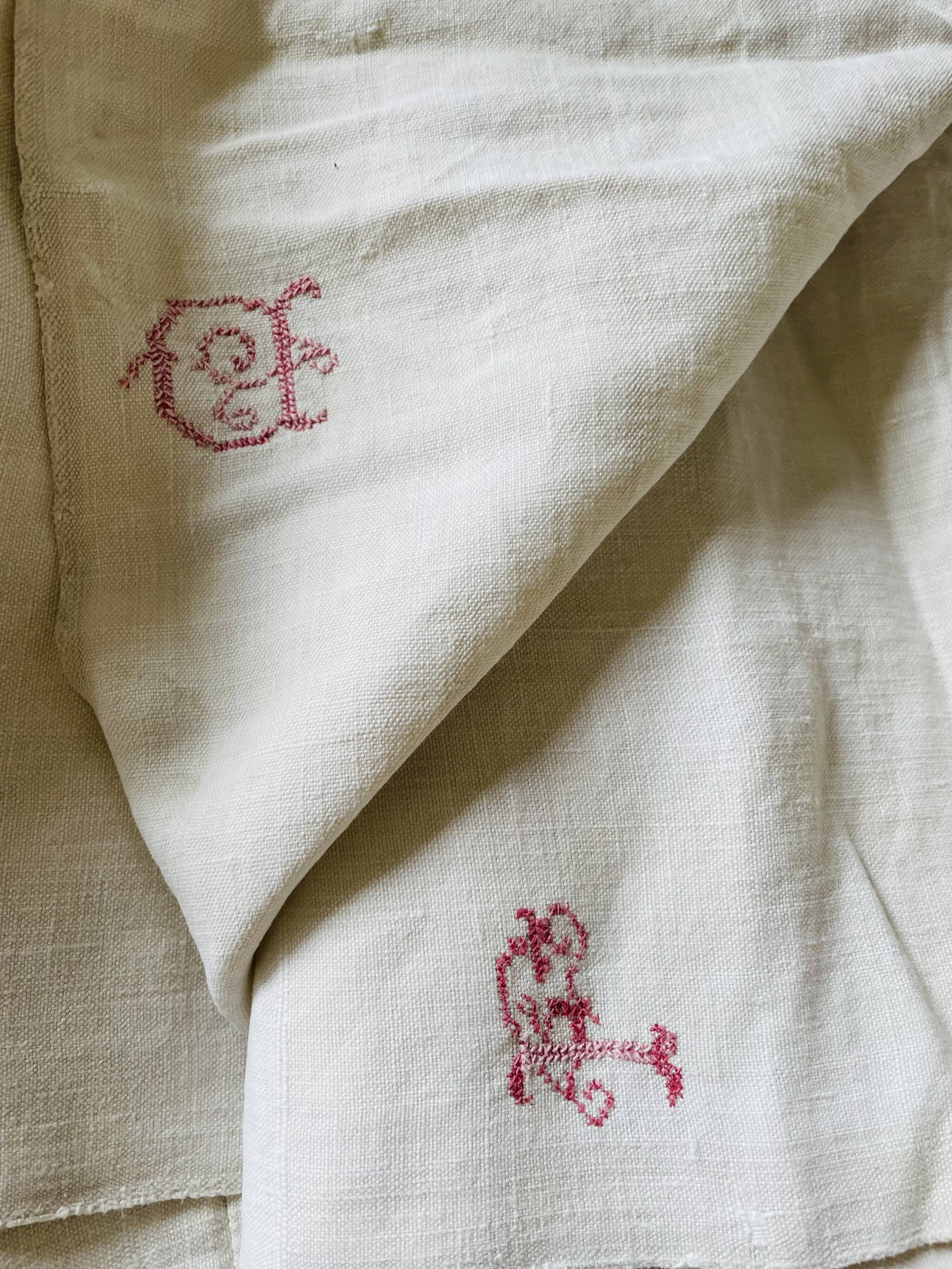Old linen sheet embroidered red monogram