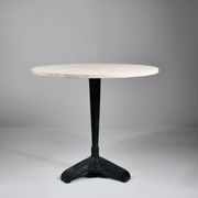 Vintage travertine bistro/dining table with metal base. (B)