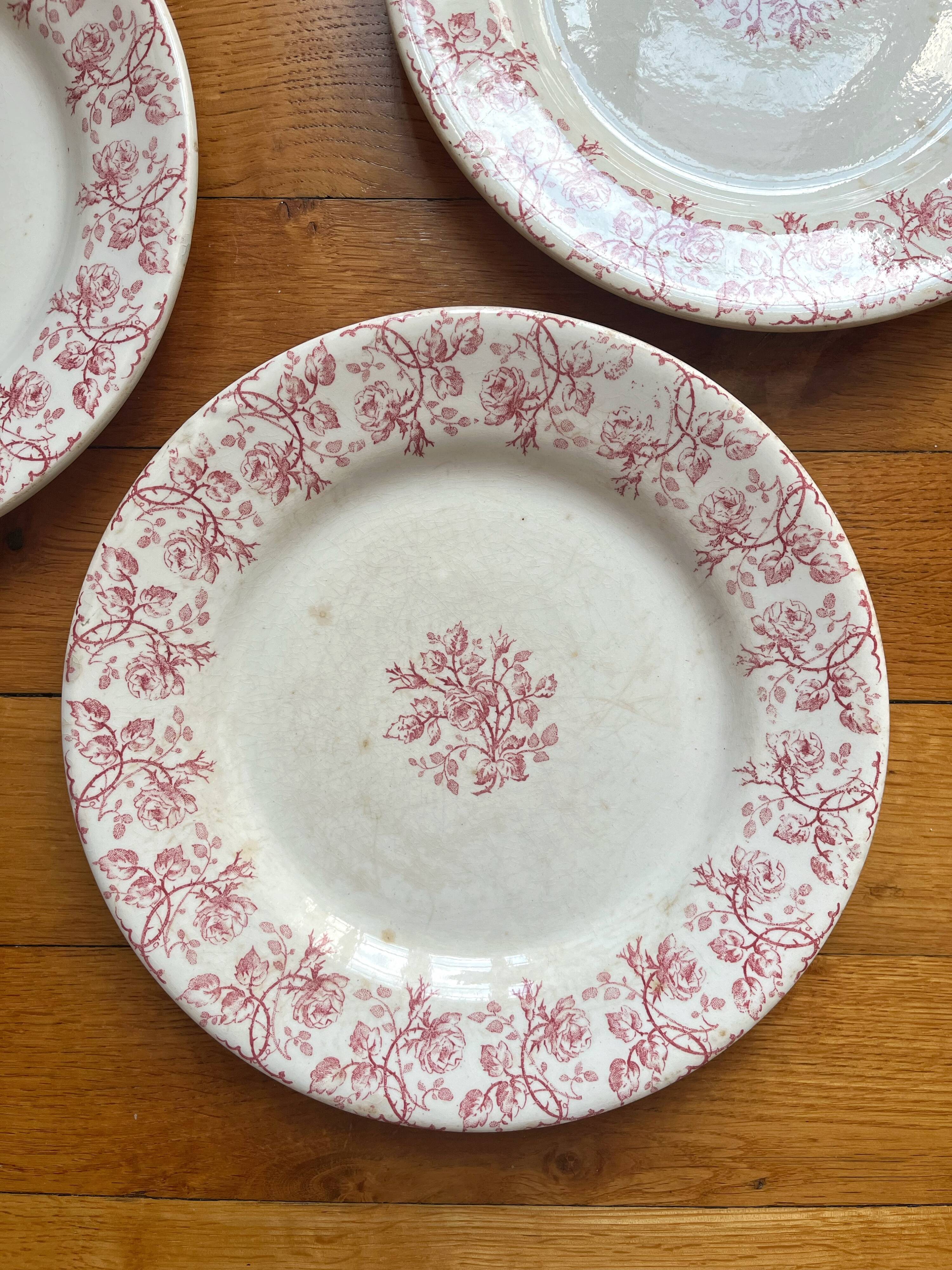 4 flat plates in iron earth Garland of roses, Opaque de Gien