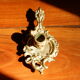 Bronze hand candle holder, cellar rat
