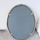 Miroir en métal argenté ovale 1950