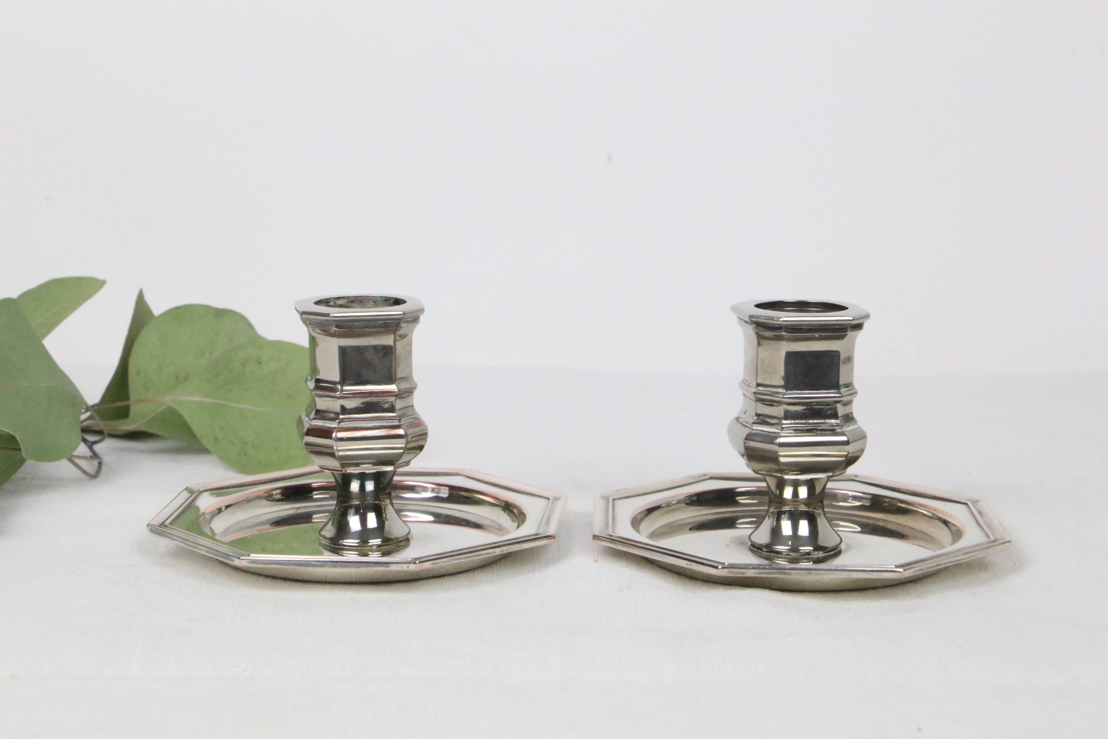 Pair of silver-plated metal candlesticks
