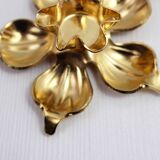 Pair of brass "flower" candlesticks