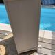 Beautiful art deco jam cupboard in delicate beige tone / and wicker basket