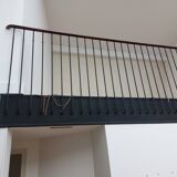 Old bistro staircase from the early 20th century with railing