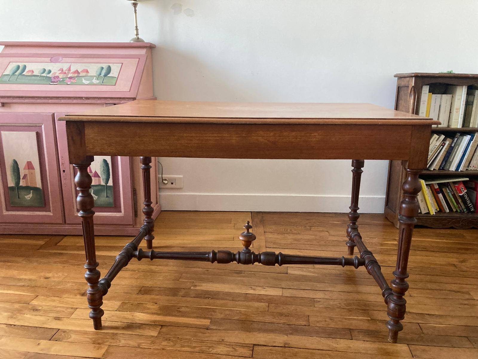 Table with a spacer topped with a spinning top.