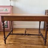 Table with a spacer topped with a spinning top.