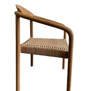 Solid wood chair with weaved seat and armrests