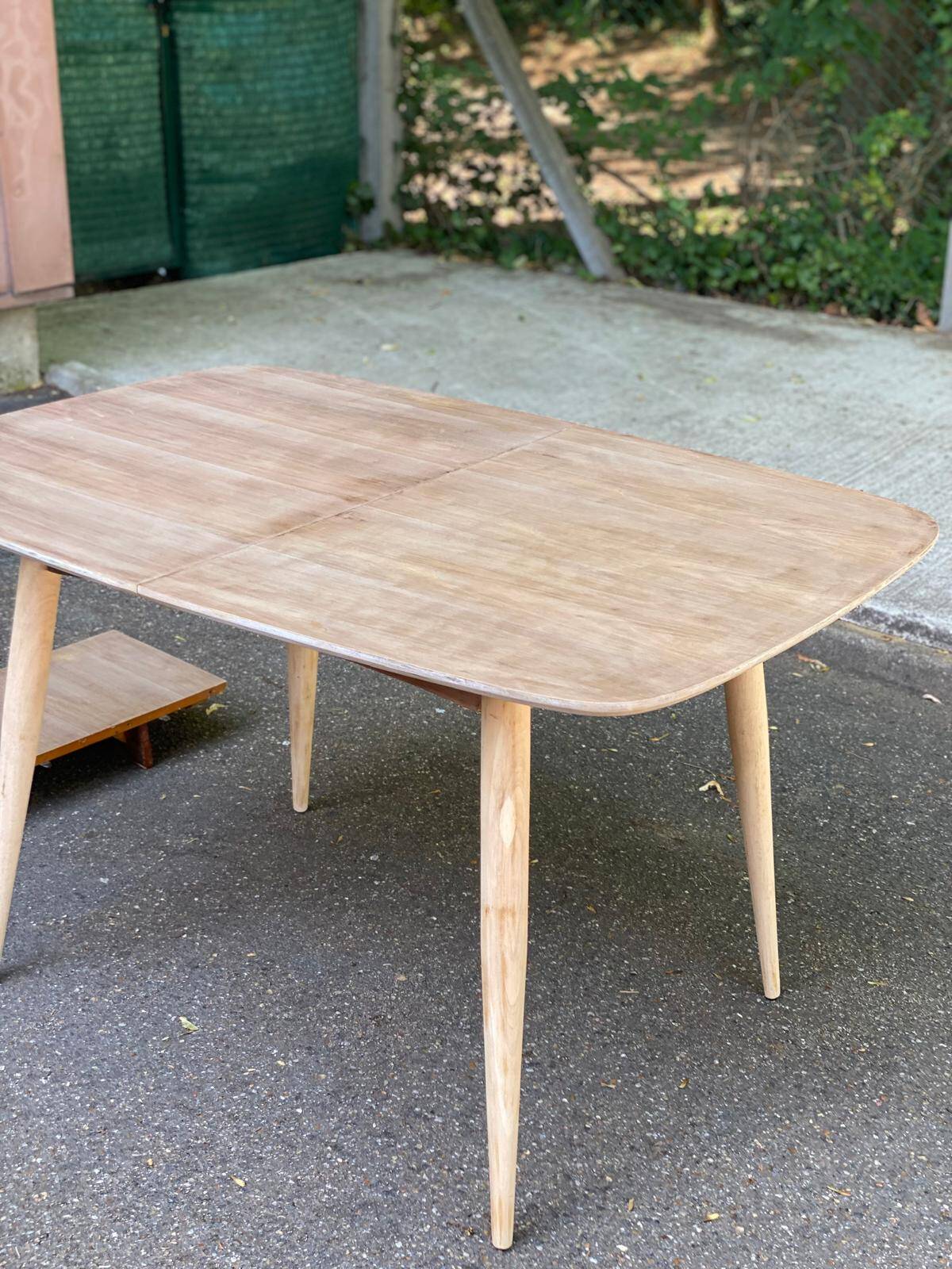 Renovated Scandinavian extendable dining table in teak and veneer from 1980.