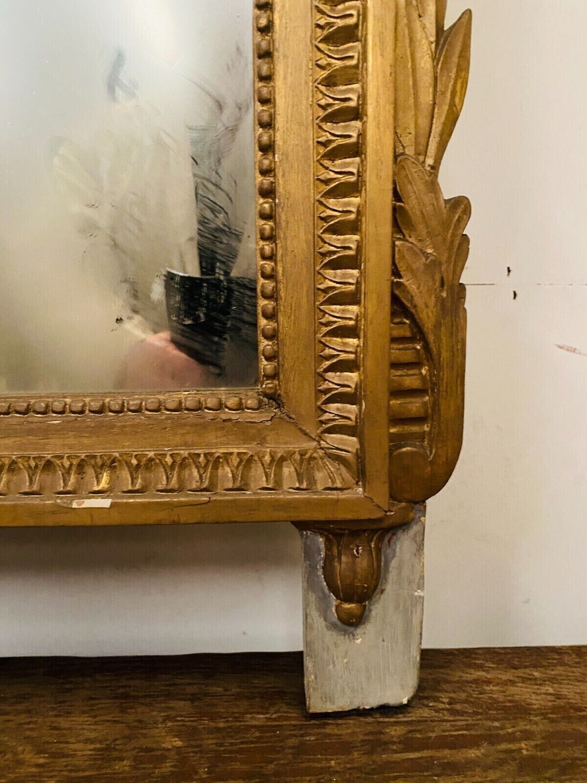 Louis XVI style mirror in wood and gilded stucco XIX century,, 122x72 cm