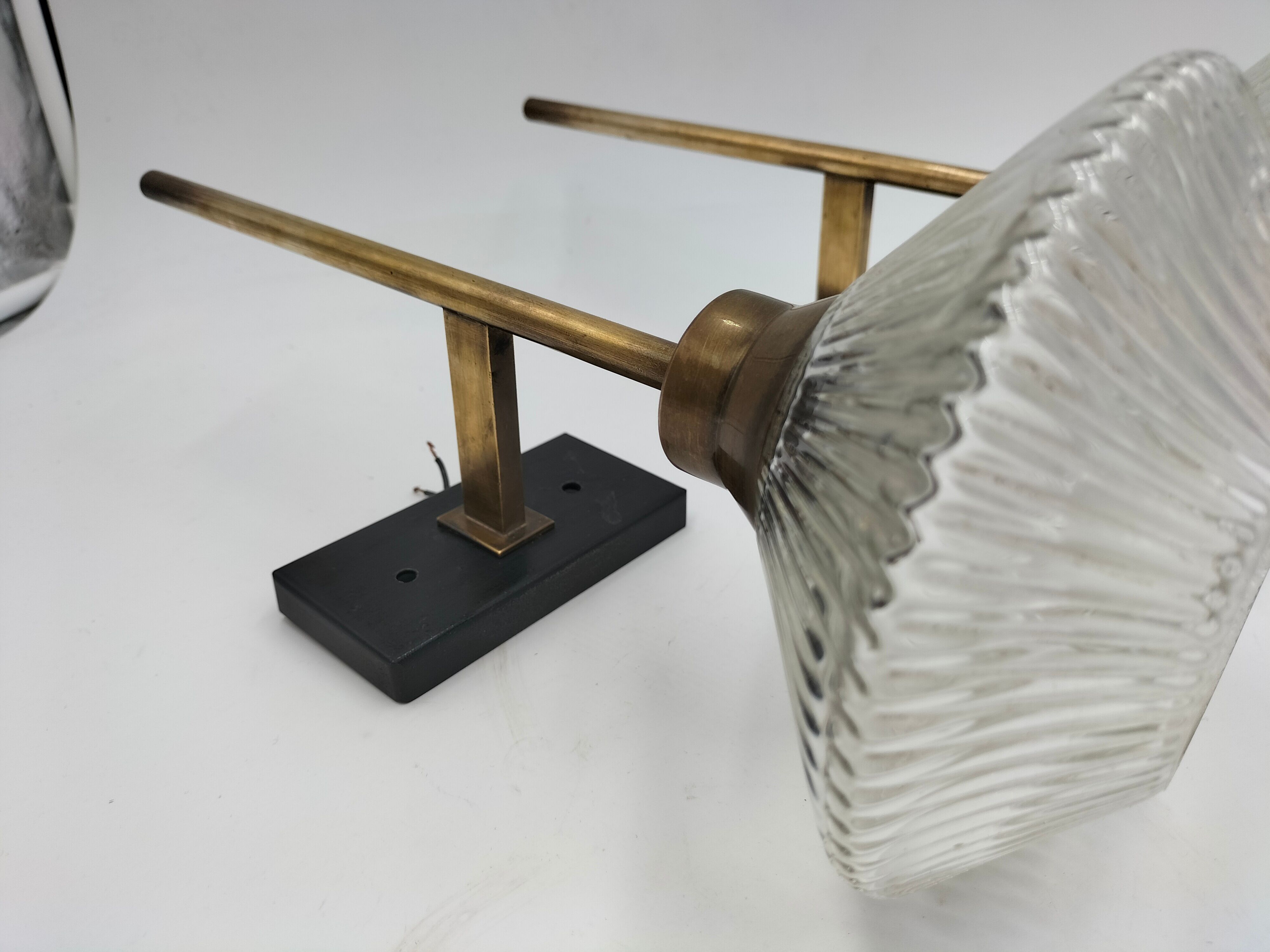 Pair of brass and glass wall lamps