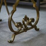 Side table with a gilt wrought iron base attributed to Gilbert Poillerat, with a travertine top, 1940s