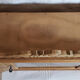 Art-deco wall showcase in raw oak