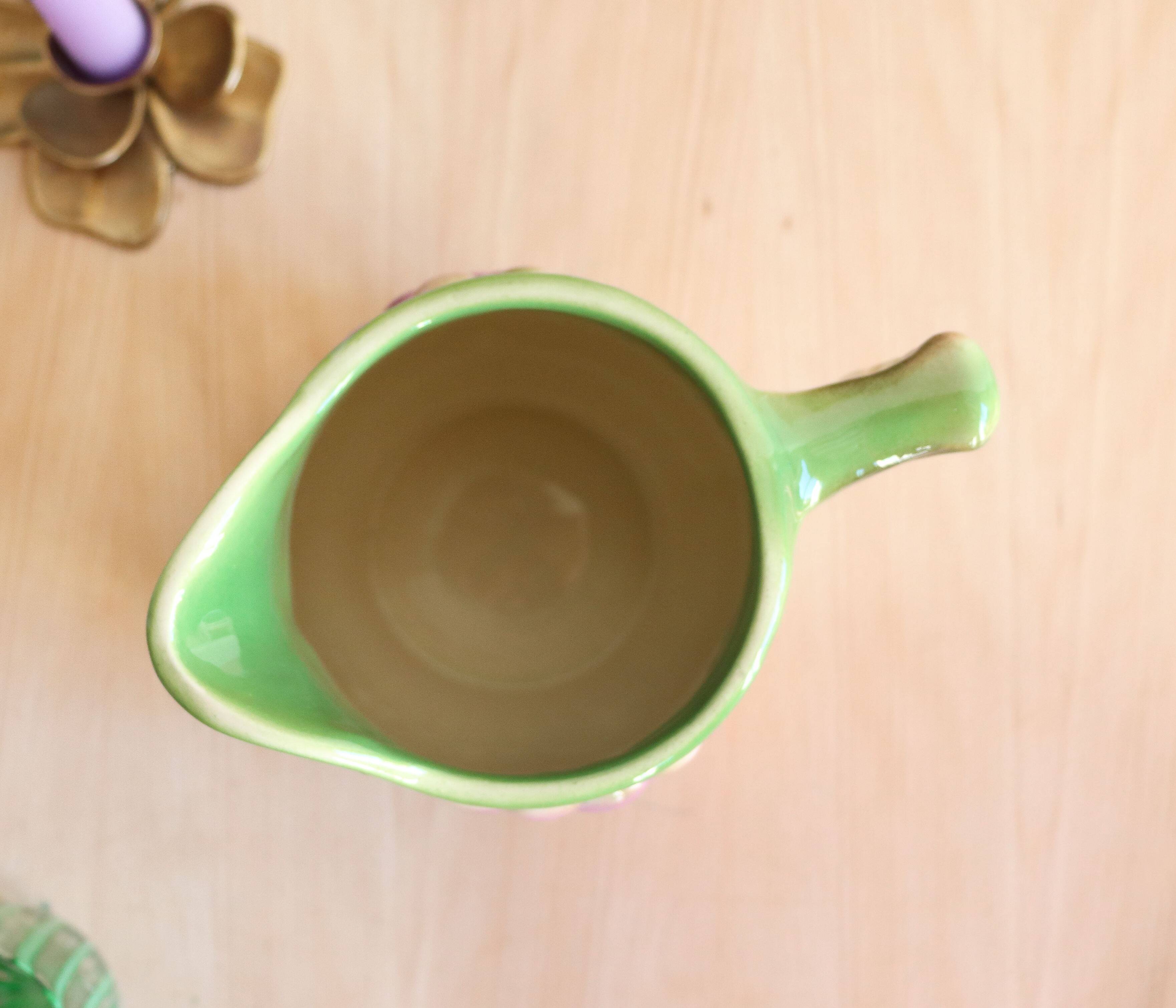 Barbotine pitcher from the 20s/30s with vine and grape decoration, Saint-Clément earthenware factory
