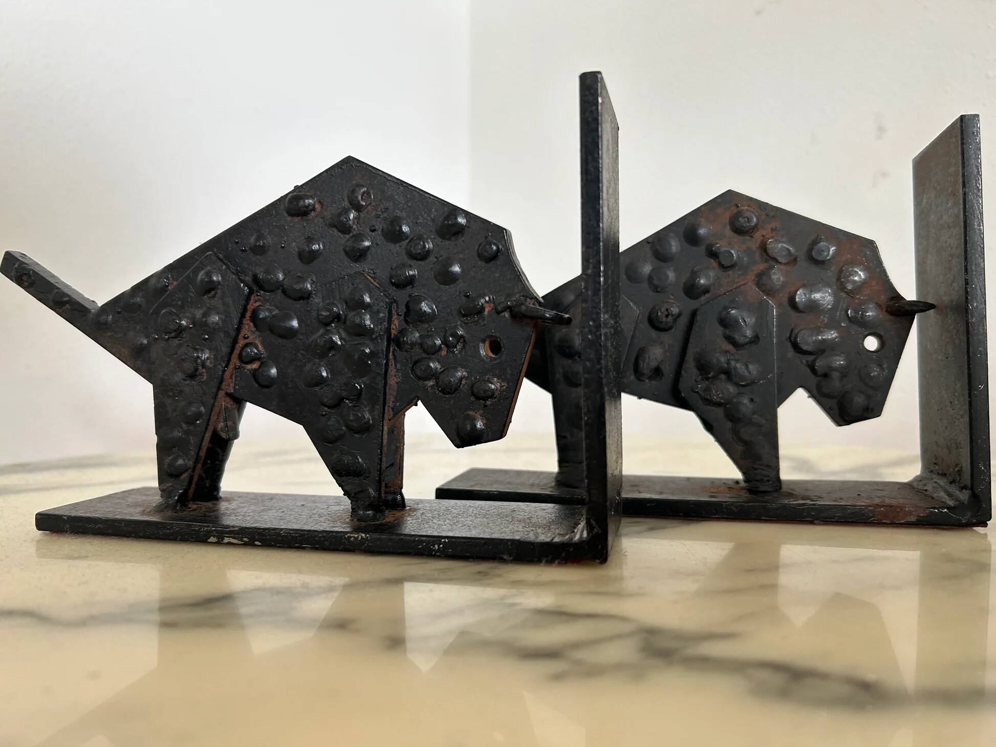 Pair of brutalist buffalo / bison bookends, black metal, mid-century
