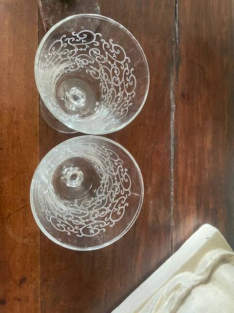2 large engraved water glasses in arabesque.