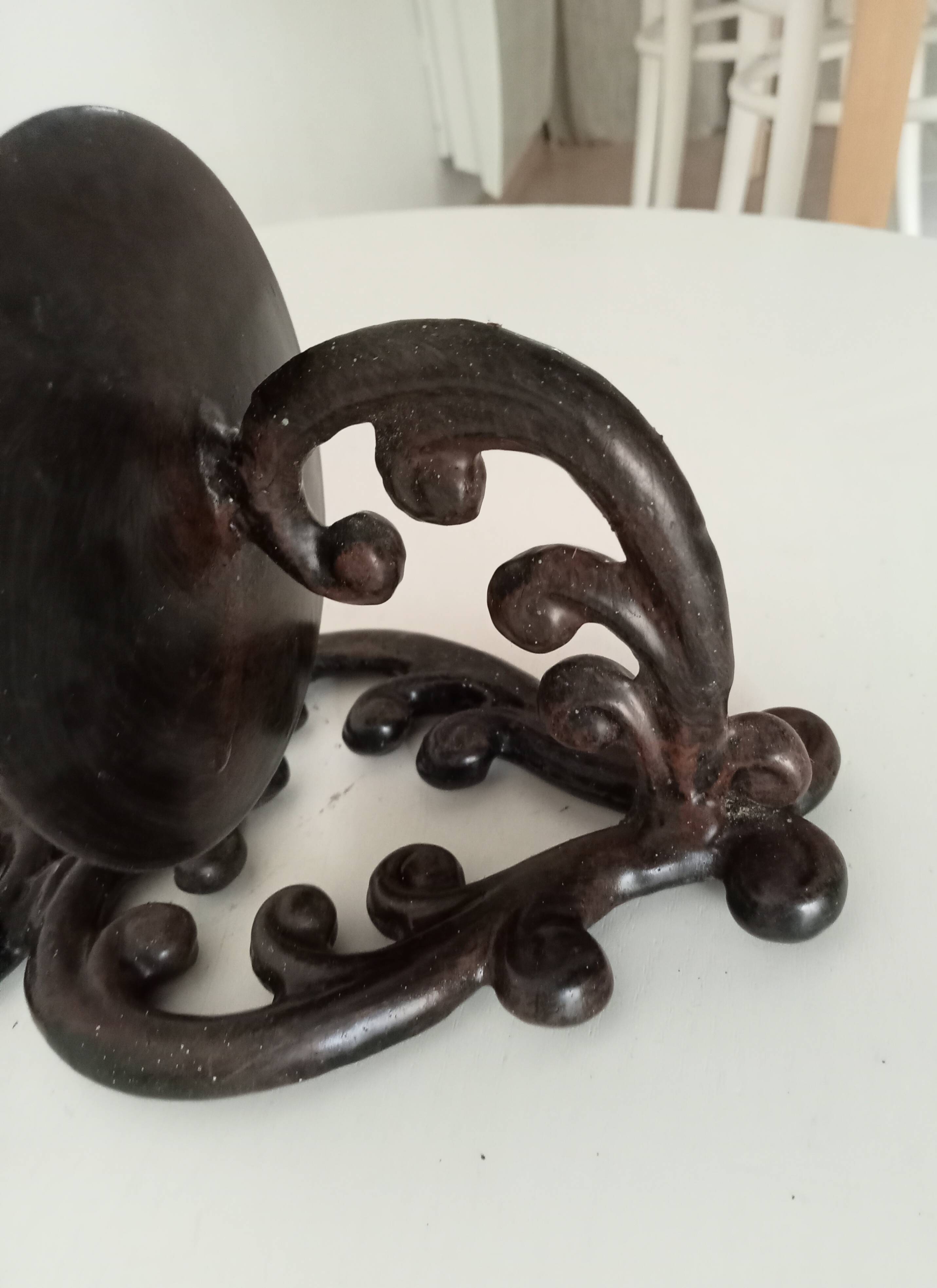 Antique wall candle holder in enamelled cast iron
