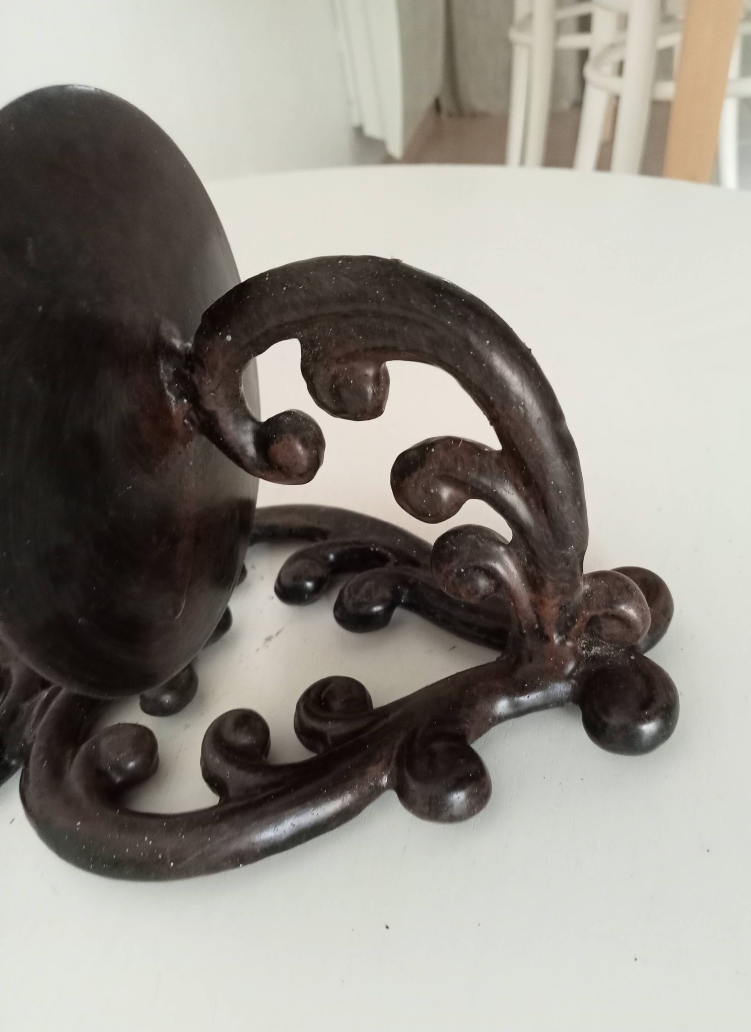 Antique wall candle holder in enamelled cast iron