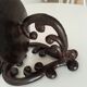 Antique wall candle holder in enamelled cast iron