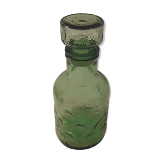 Bottle decant in old green glass