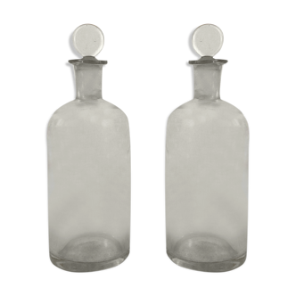 2 old glass bottles