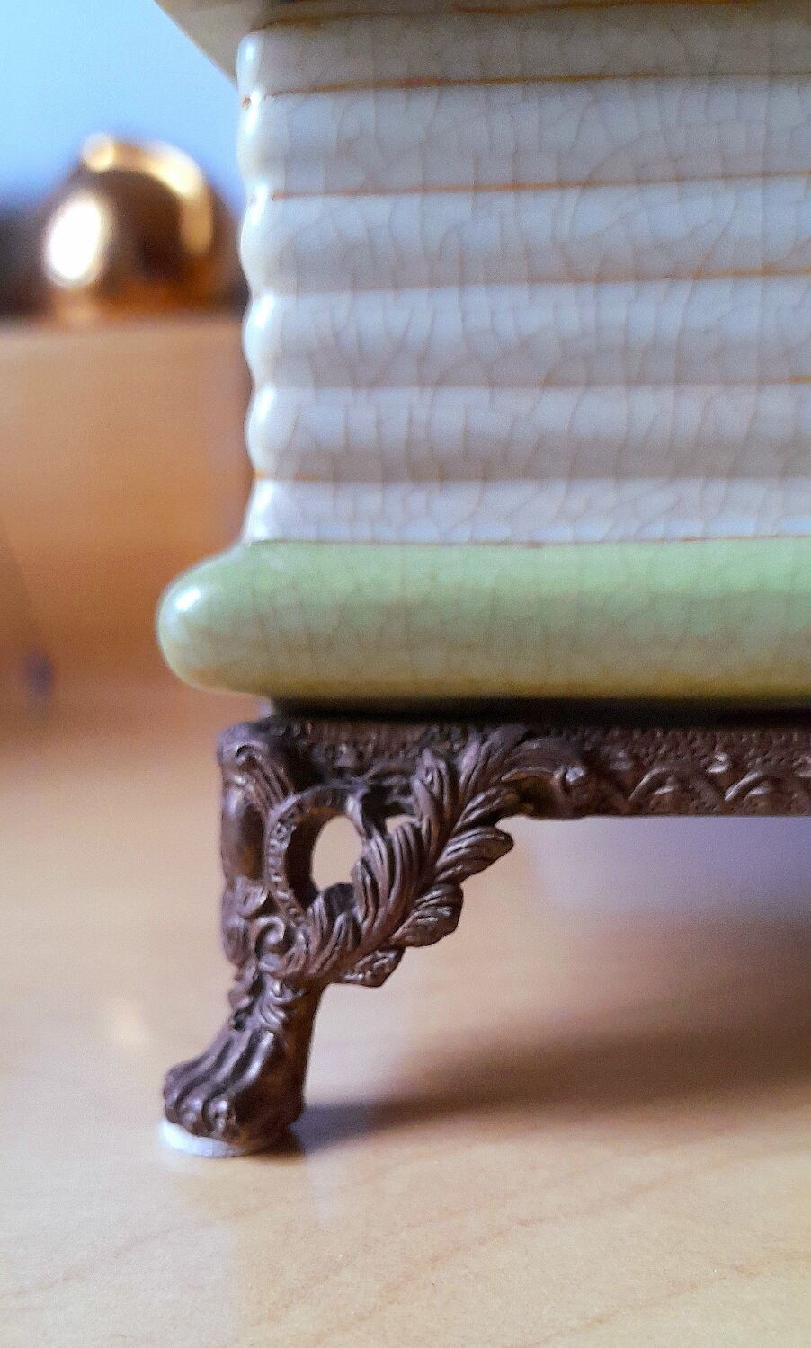 Porcelain box on claw feet