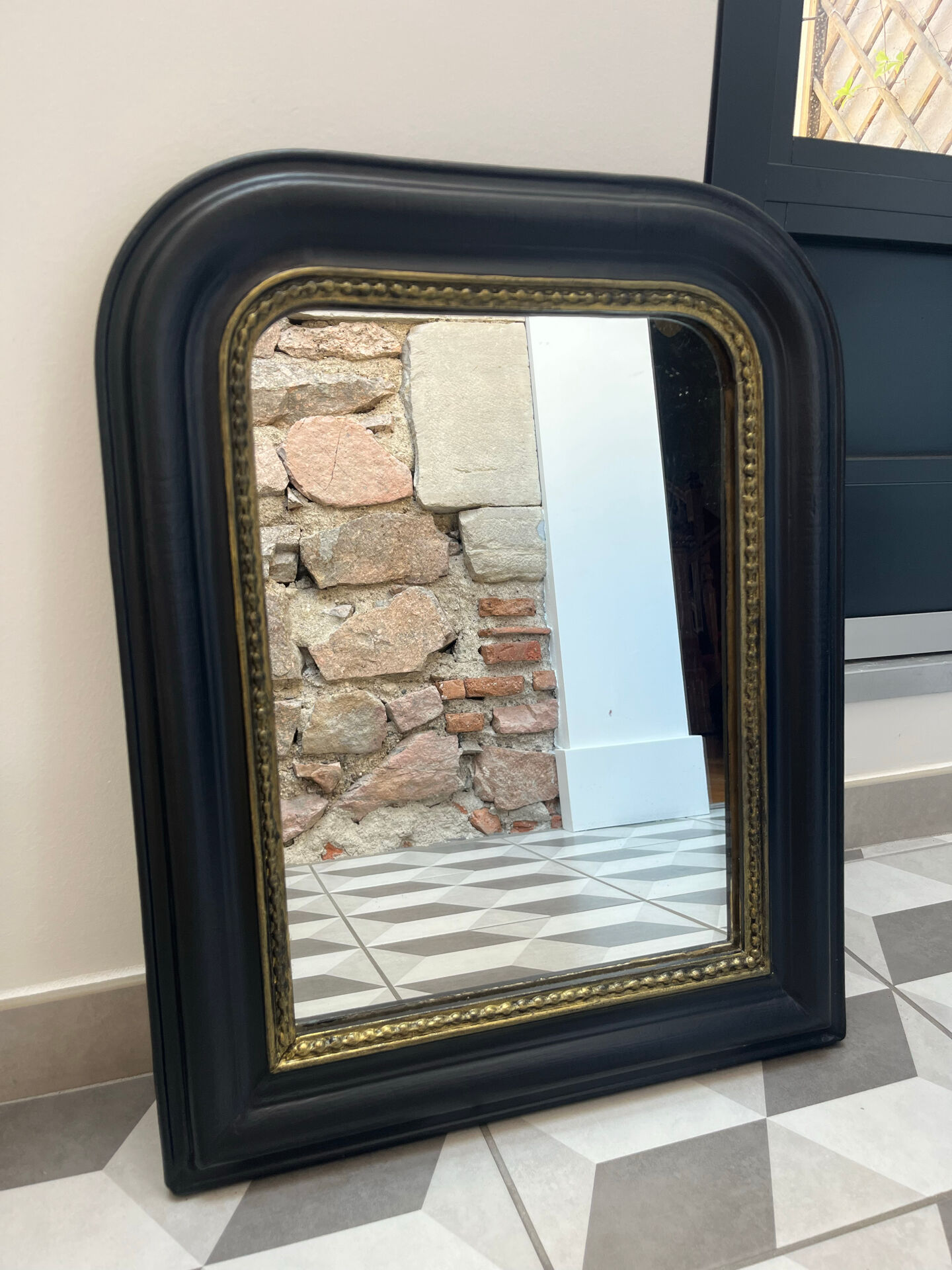 Louis Philippe mirror in black and gold