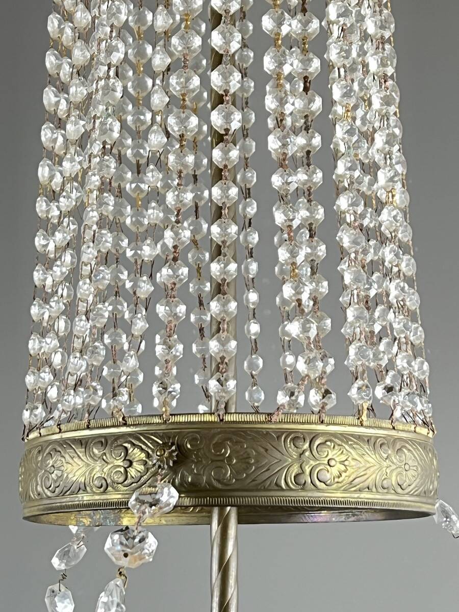 Empire-style chandelier in bronze with crystal pendants, early 20th century.