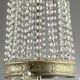 Empire-style chandelier in bronze with crystal pendants, early 20th century.